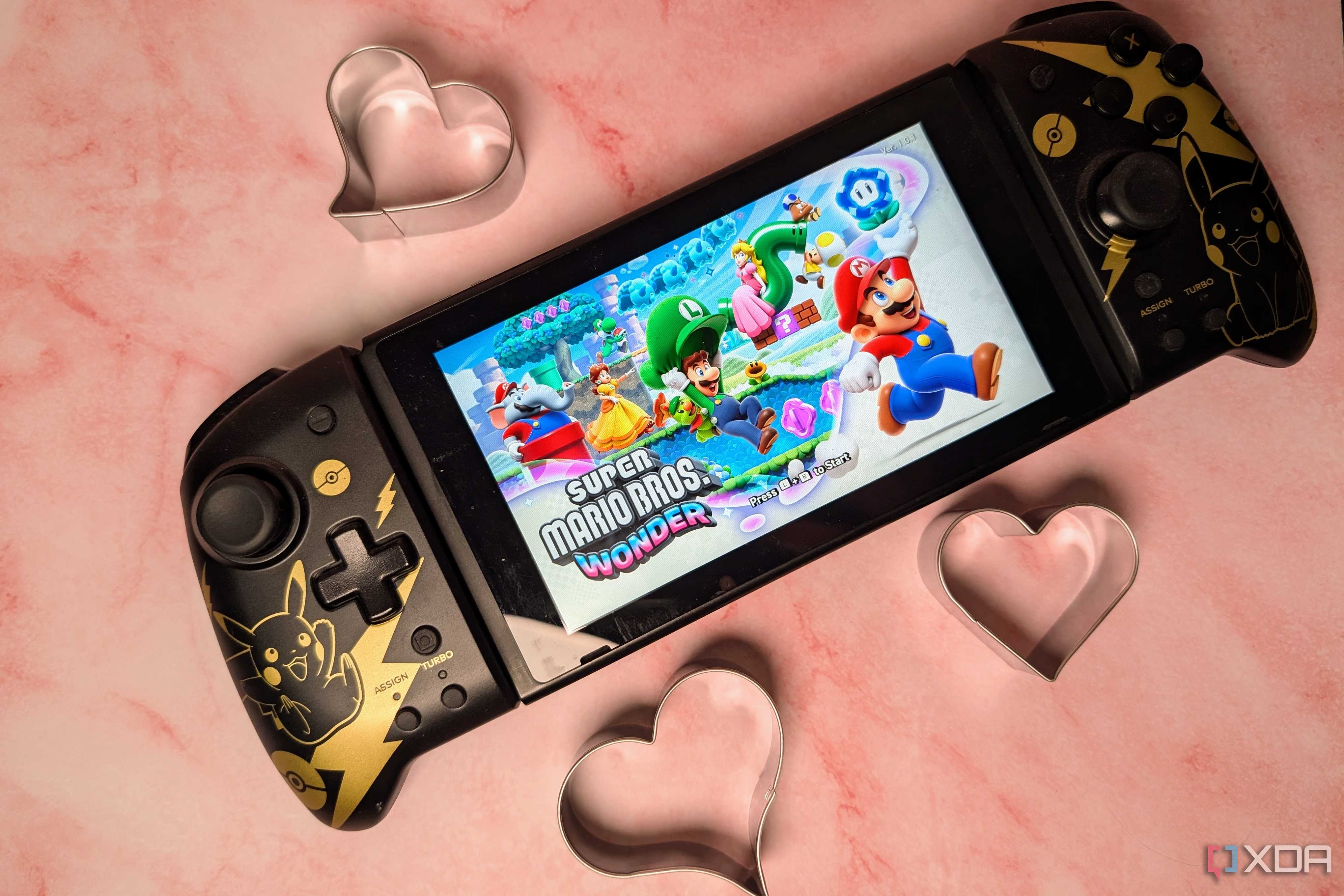 Nintendo Switch with Mario Wonder surrounded by hearts