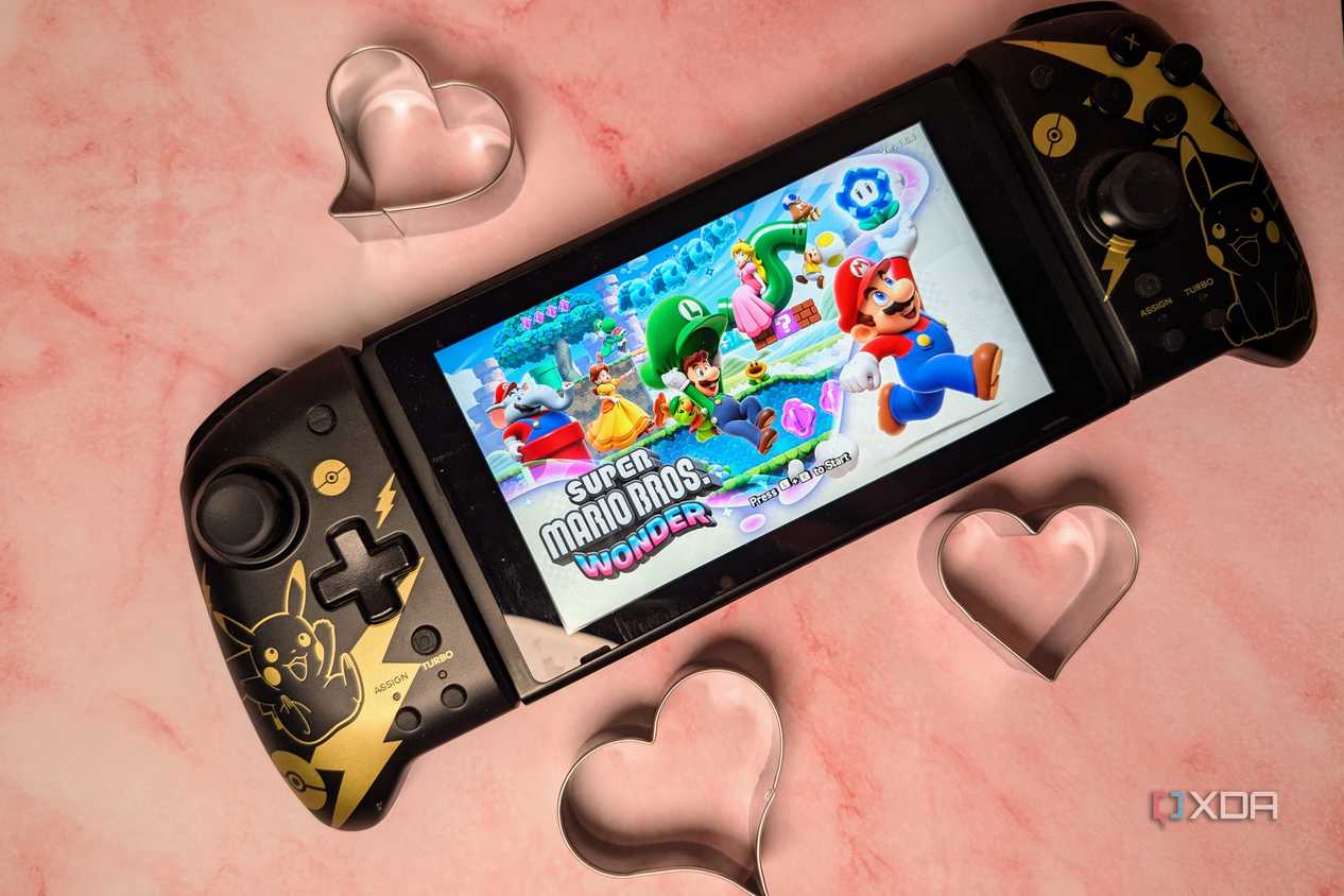 Nintendo Switch with Mario Wonder surrounded by hearts