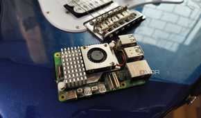 A Raspberry Pi 5 resting against a Yamaha Pacifica 012