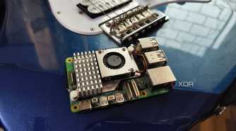 A Raspberry Pi 5 resting against a Yamaha Pacifica 012