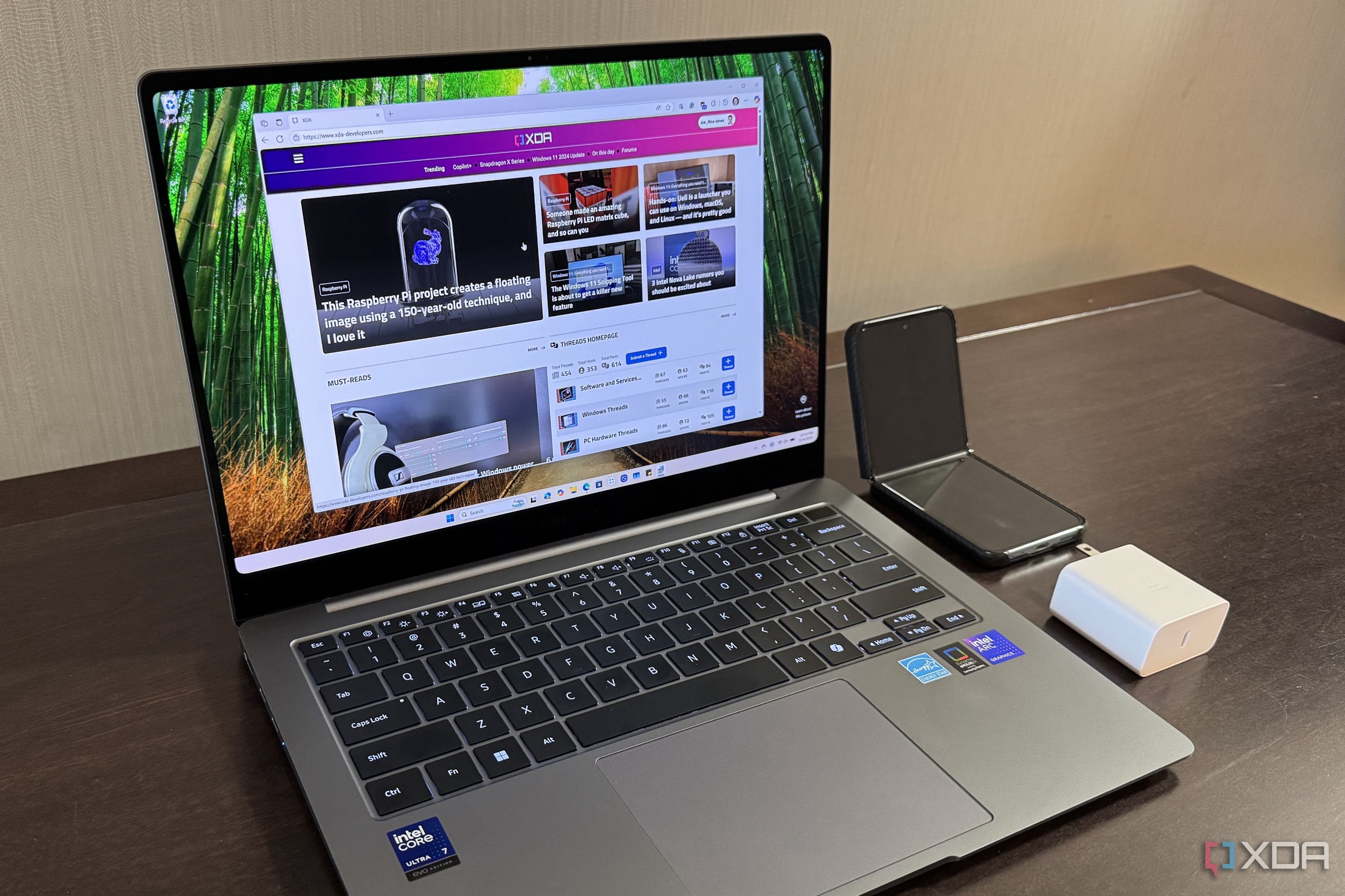 samsung galaxy book 5 pro next to galaxy phone