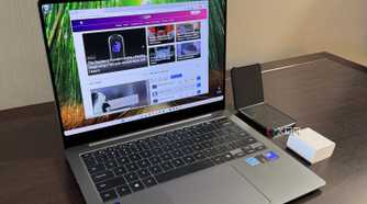 samsung galaxy book 5 pro next to galaxy phone