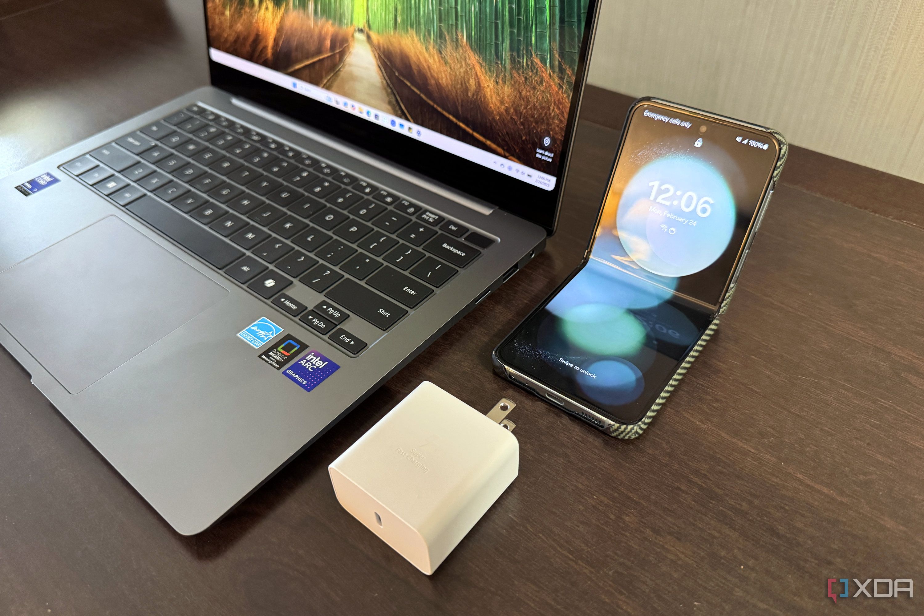 samsung galaxy book 5 pro next to charger and z flip 5