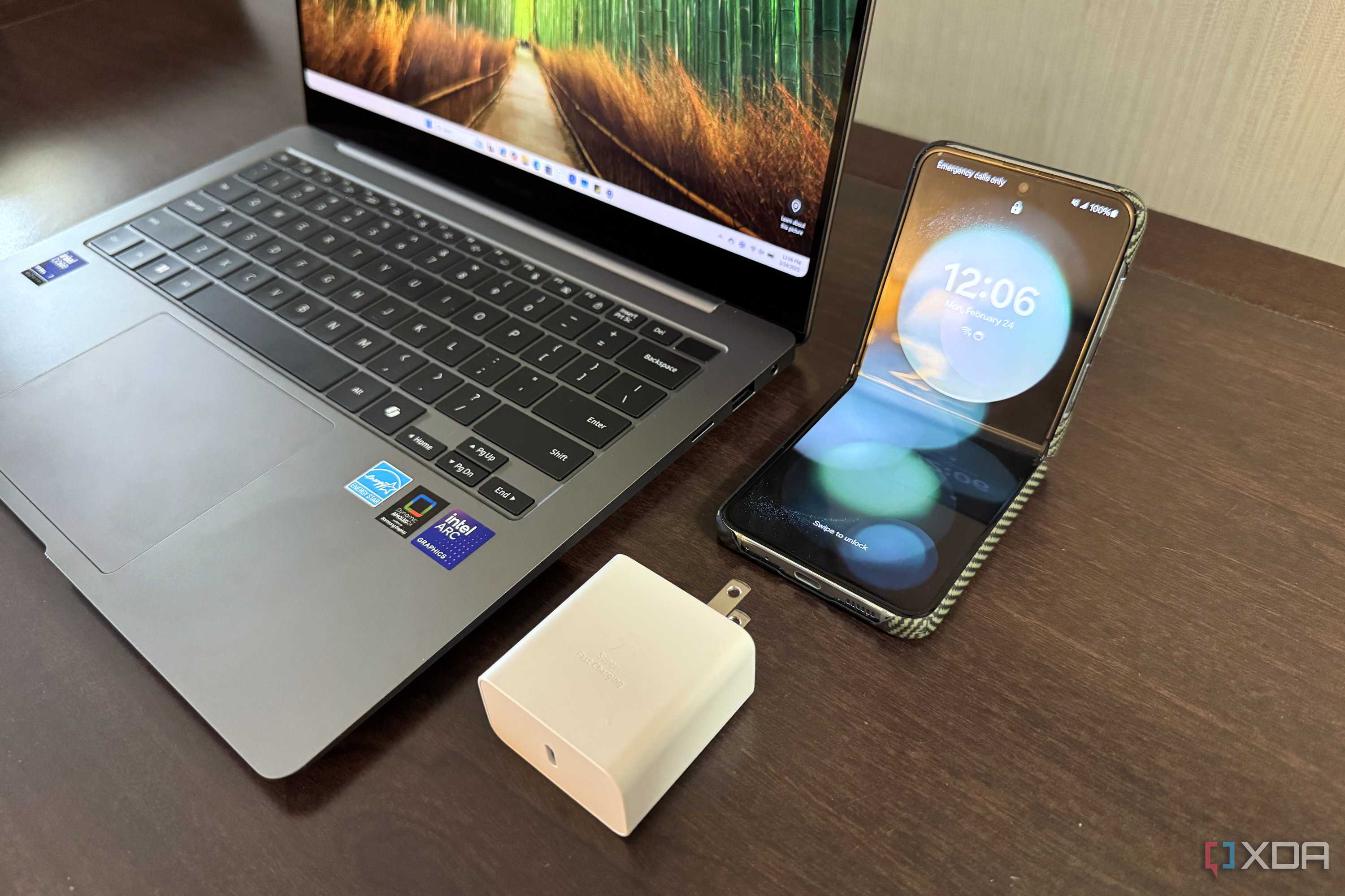 samsung galaxy book 5 pro next to charger and z flip 5