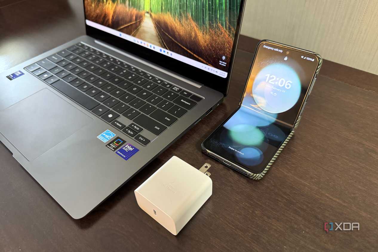 samsung galaxy book 5 pro next to charger and z flip 5