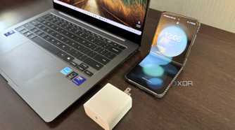 samsung galaxy book 5 pro next to charger and z flip 5