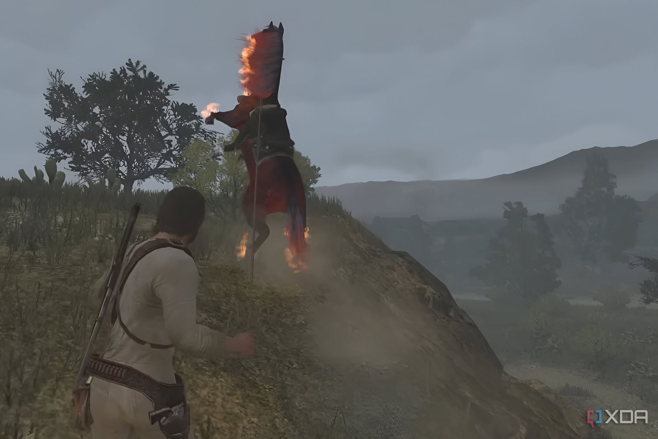 A screenshot from Red Dead Redemption Undead Nightmare, showing the protagonist throw a lasso around the neck of a flaming horse.