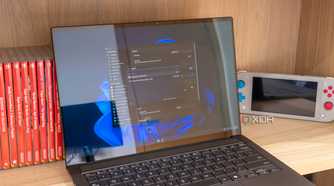 A Windows 11 laptop showing the Ueli settings window and search bar