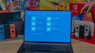 A Windows 11 laptop displaying the Windows Recovery Environment