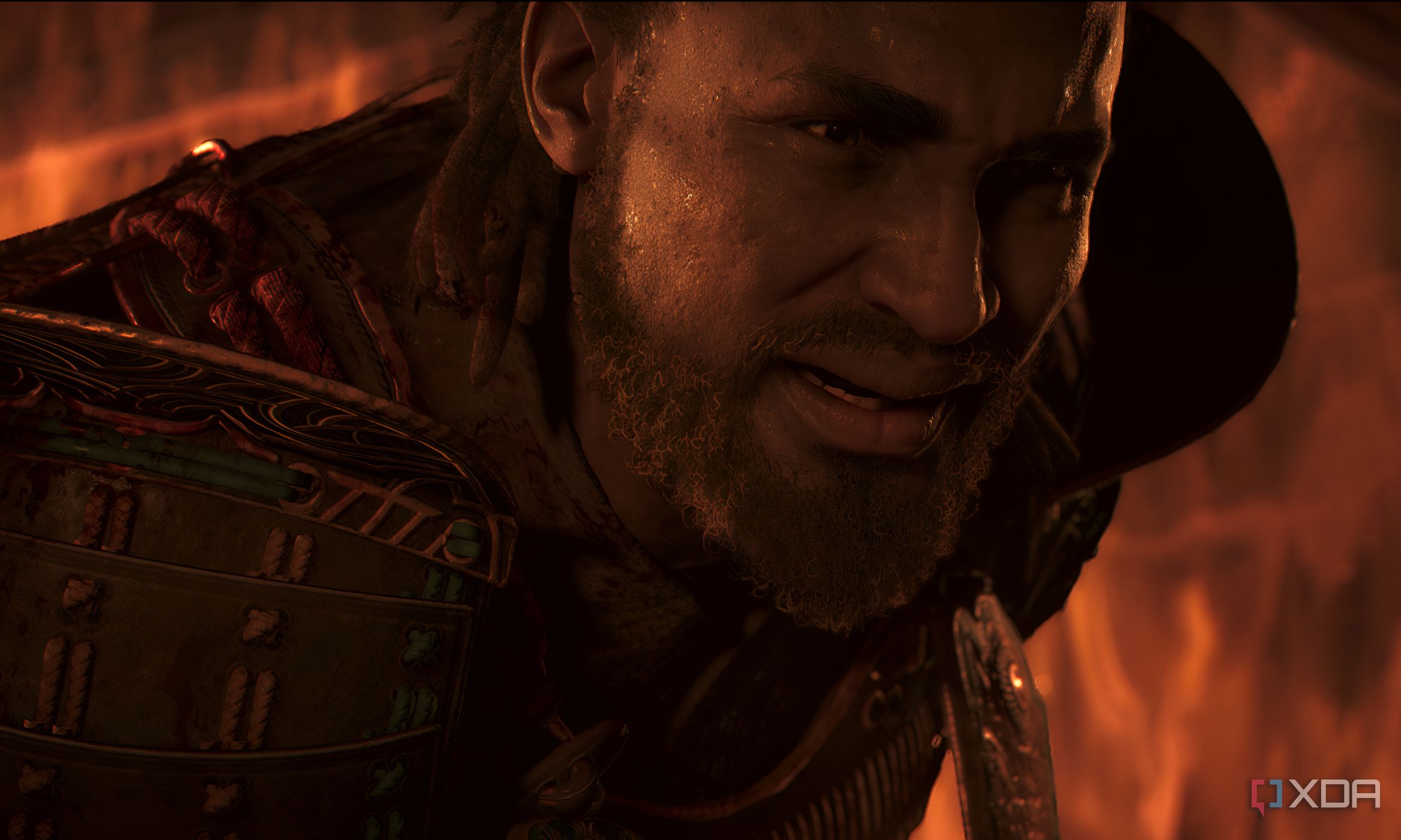 A screenshot from Assassin's Creed Shadows, showing Yasuke, the protagonist, sweating in a fiery room.