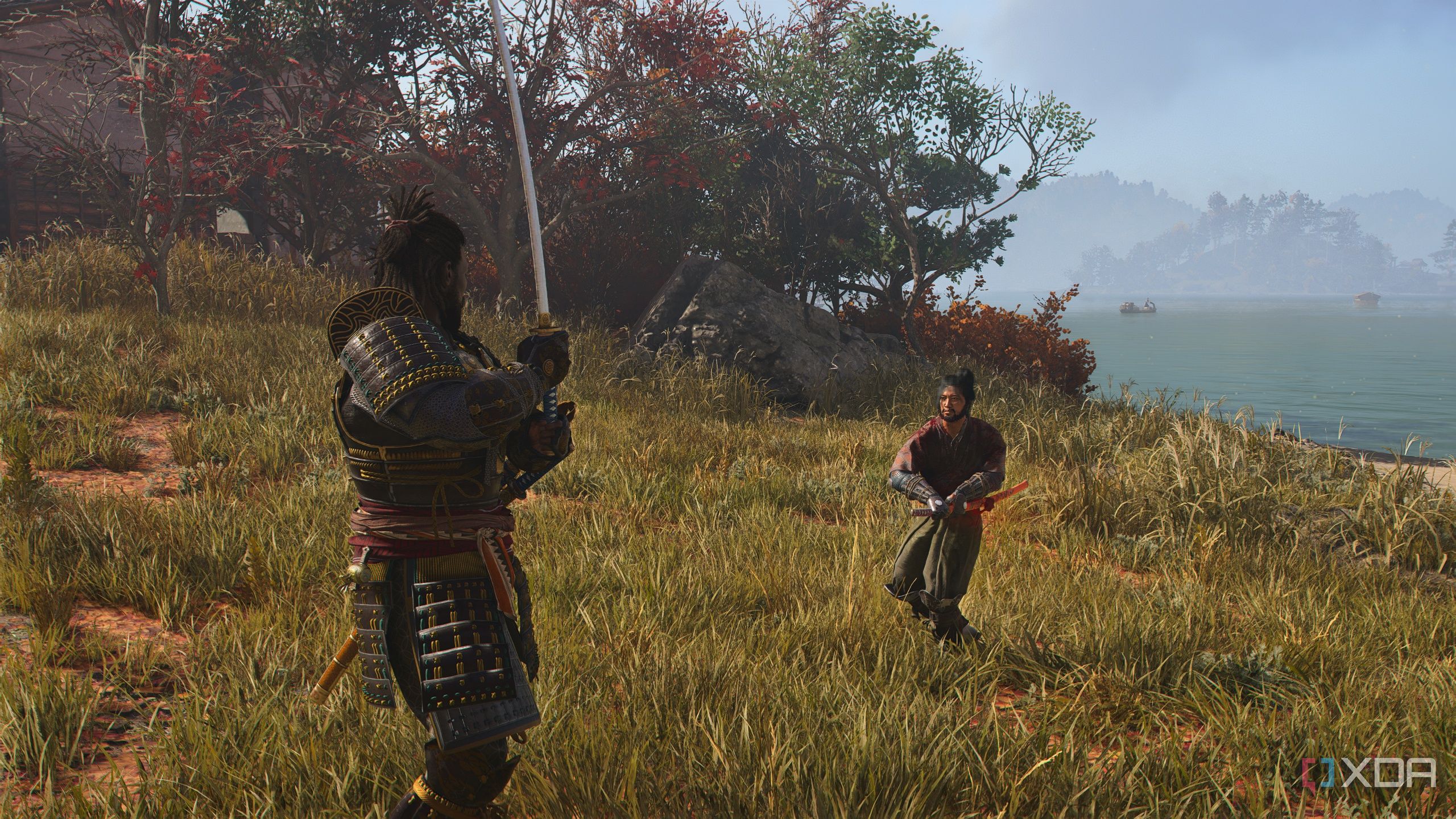 A screenshot from Assassin's Creed Shadows, showing Yasuke ready himself for battle against another sword-wielding man.