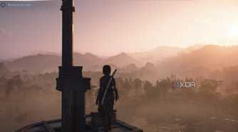 A screenshot from Assassin's Creed Shadows, showing Naoe, the protagonist, standing atop a high point, looking at a mist-shrouded mountainside.