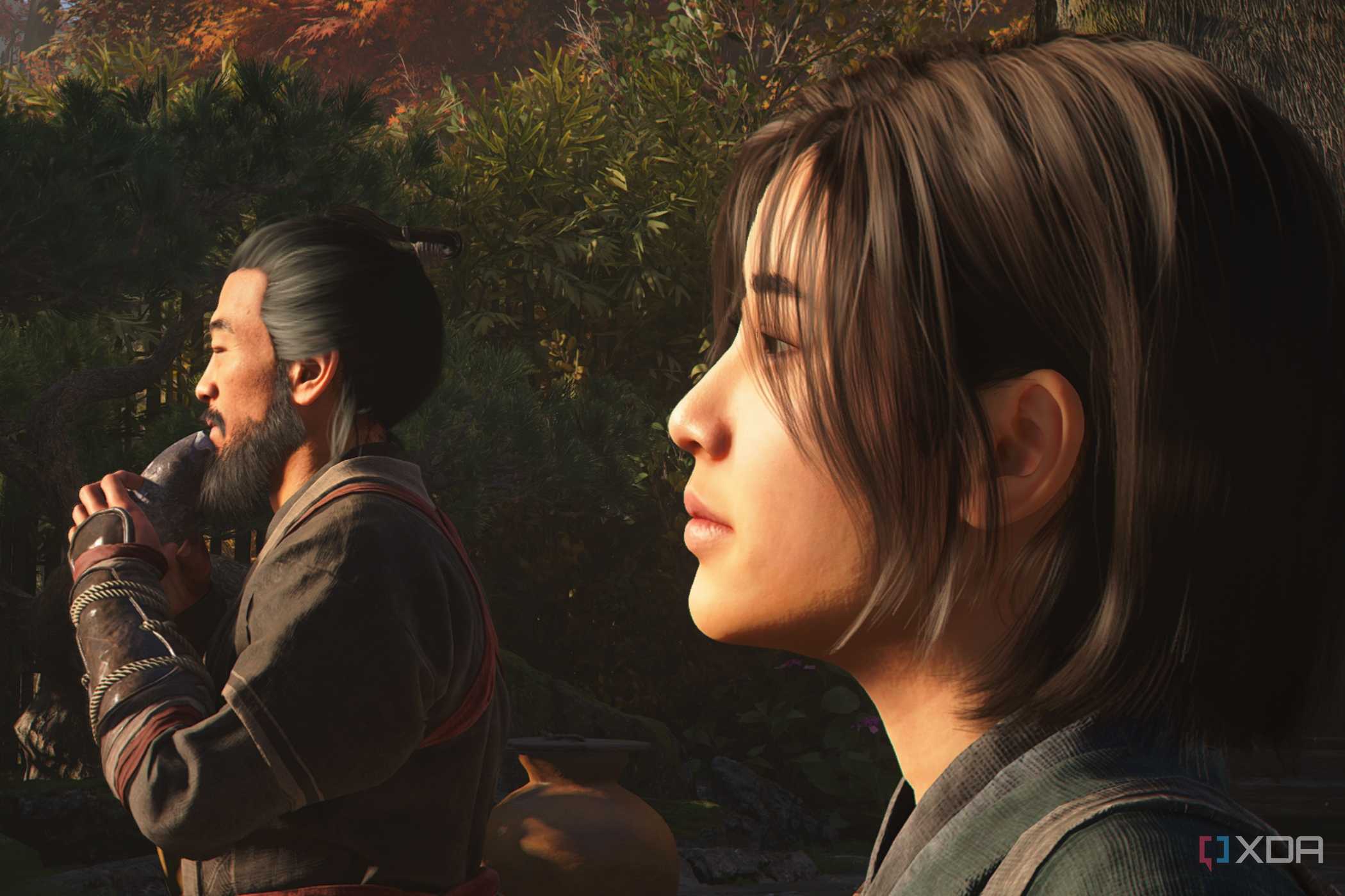 A screenshot from Assassin's Creed Shadows, showing the protagonist Naoe standing next to her father.