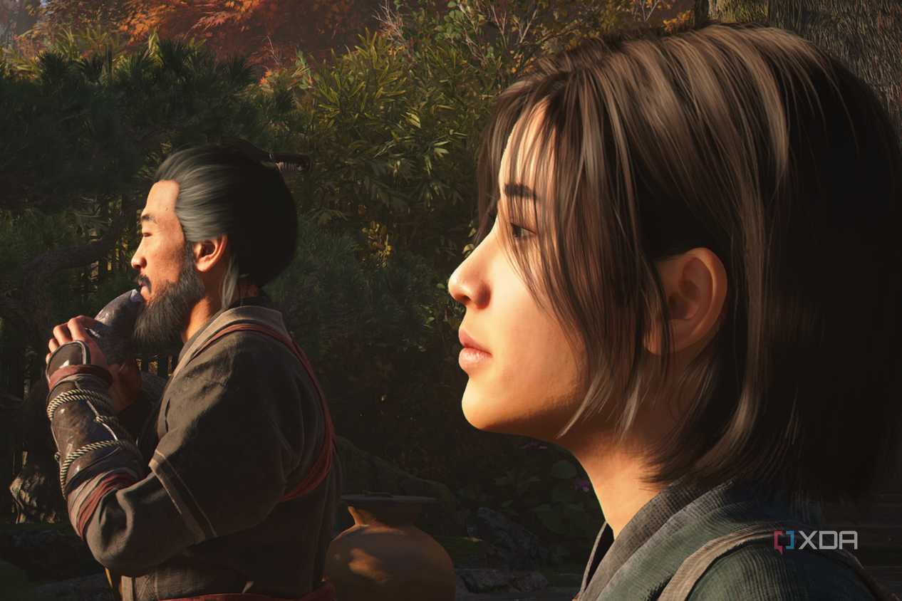 A screenshot from Assassin's Creed Shadows, showing the protagonist Naoe standing next to her father.