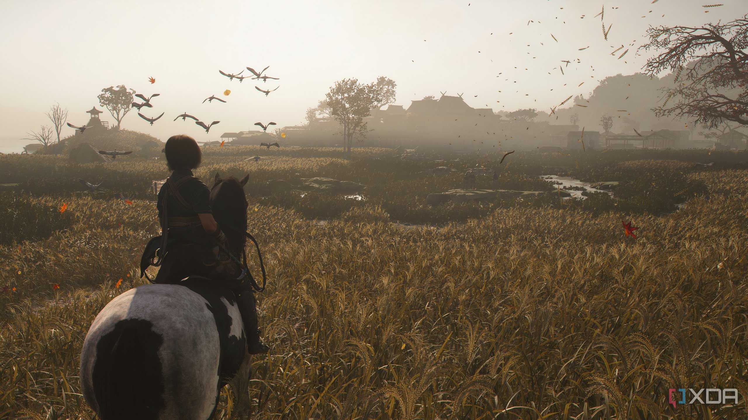 A screenshot from Assassin's Creed Shadows, showing Naoe on horseback in wetlands.