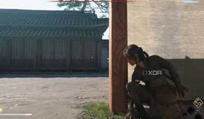 A screenshot from the game Assassin's Creed Shadows, showing Naoe, the protagonist, crouched behind a wall.