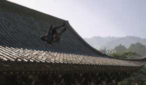 A screenshot from the game Assassin's Creed Shadows, showing Naoe, the protagonist, somersaulting off a building.