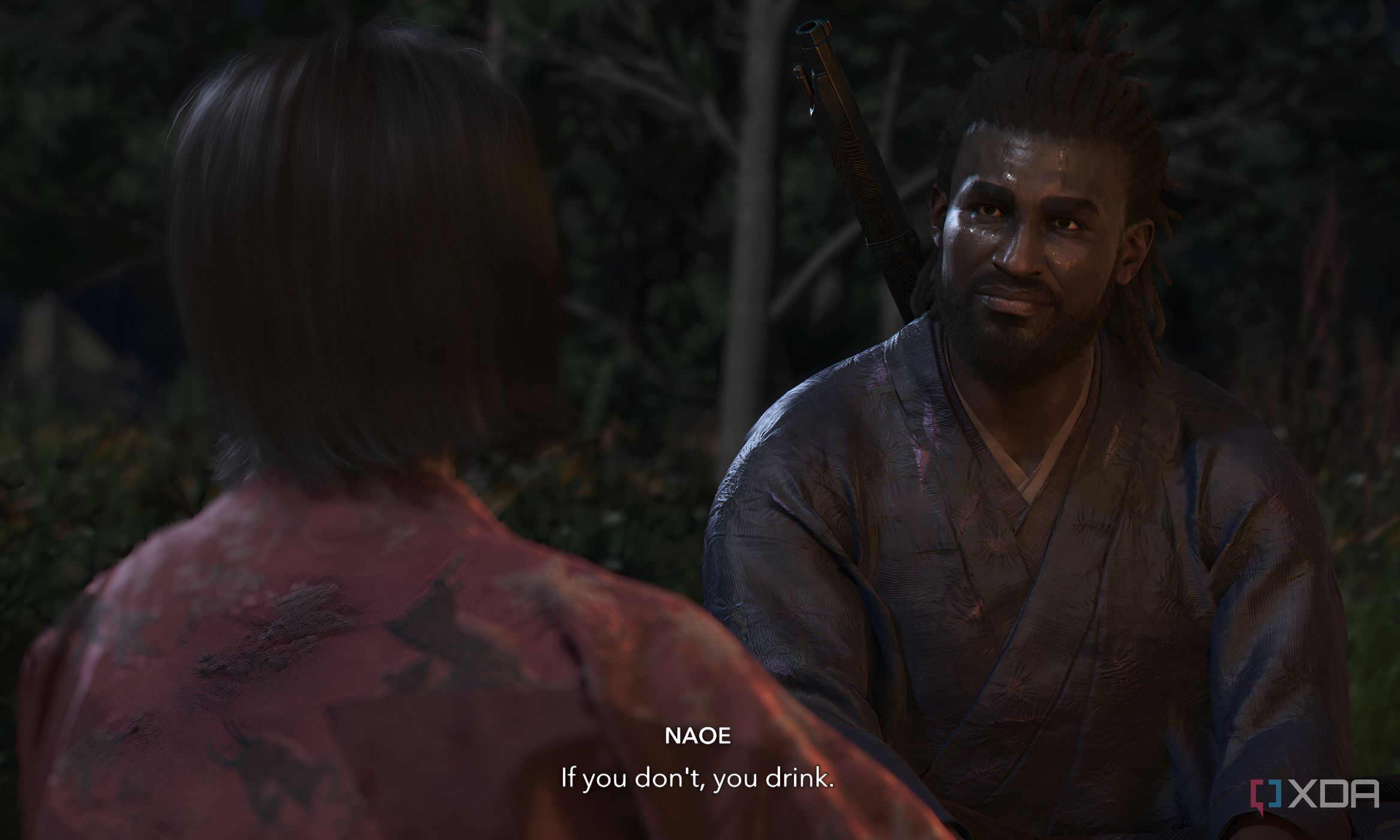 A screenshot from Assassin's Creed Shadows, showing the two protagonists sitting together.