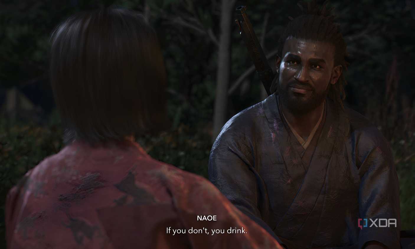A screenshot from Assassin's Creed Shadows, showing the two protagonists sitting together.