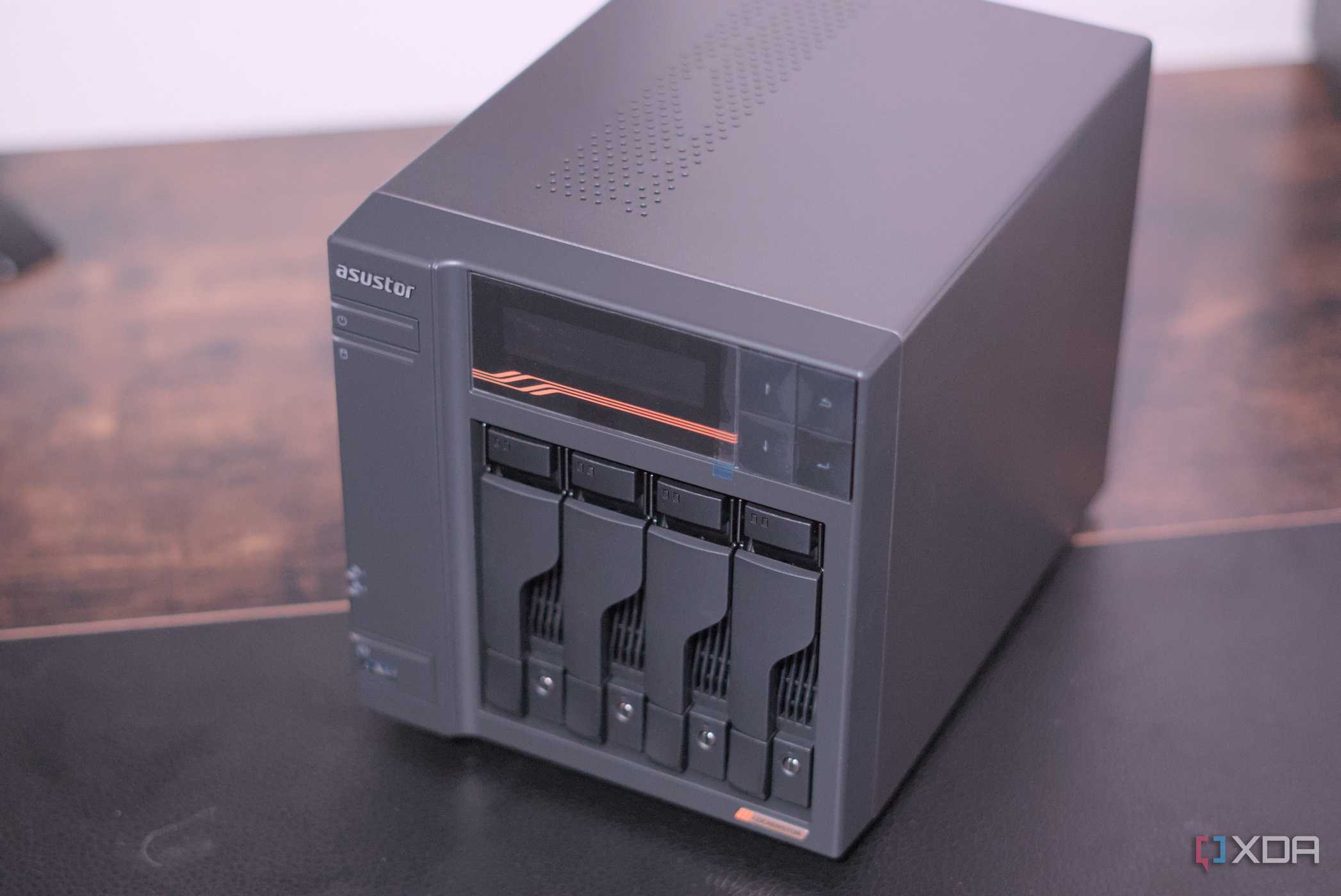 Asustor AS6804T from the front kept on a desk
