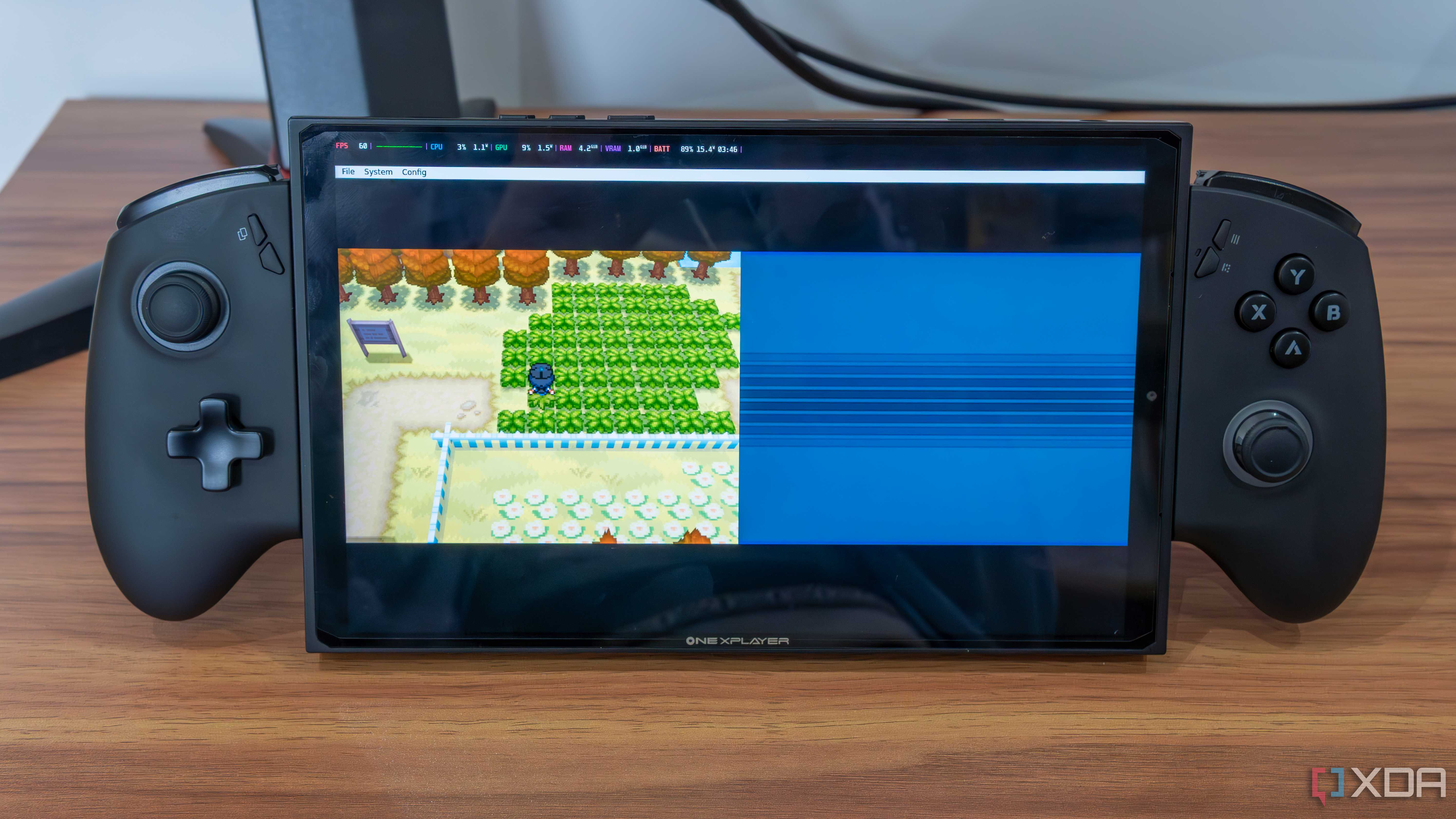 A gaming handheld running a Nintendo DS emulator in Bazzite