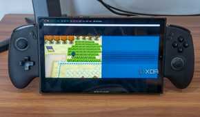 A gaming handheld running a Nintendo DS emulator in Bazzite