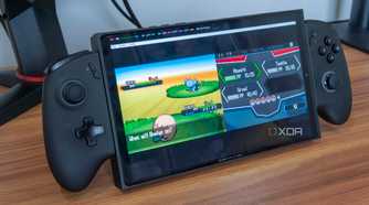 A gaming handheld running a Nintendo DS emulator in Bazzite