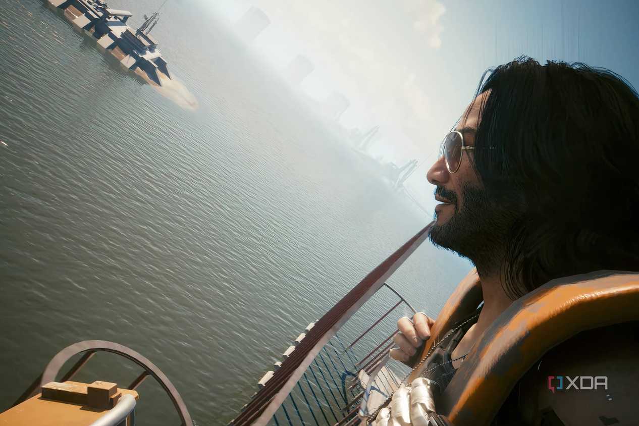 An image from the game "Cyberpunk 2077", showing Johnny Silverhand sitting on a roller coaster.