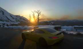 An image from the 2014 game Driveclub, showing a yellow Mercedes car frmo the side, driving in a snowy setting as the sun rises.