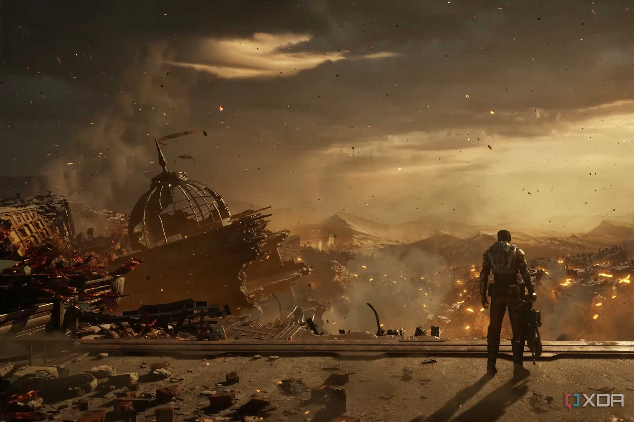 A screenshot from the game Gears 5, showing a desolate cityscape on fire.