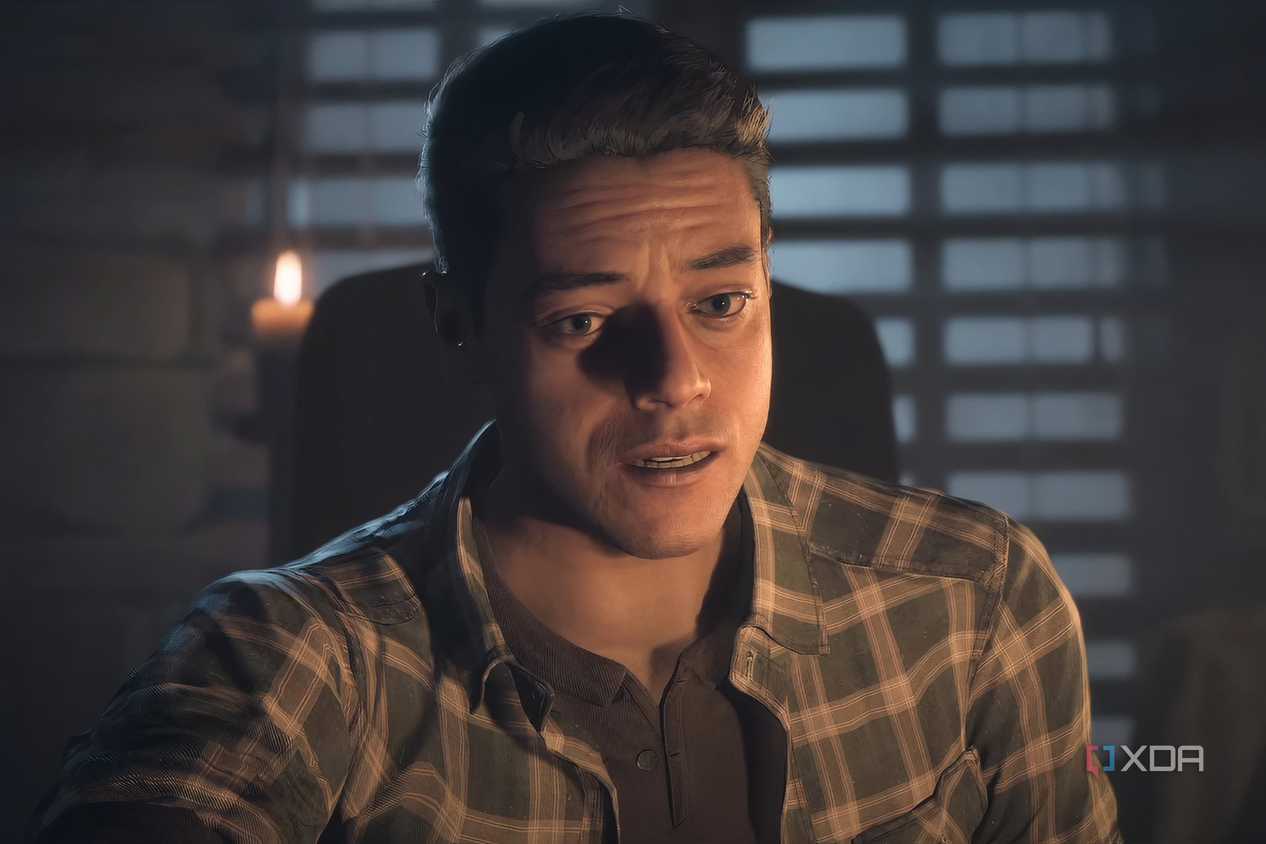 A screenshot from the game "Until Dawn", showing a man lit in candle light.
