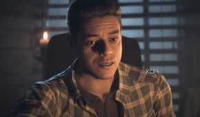 A screenshot from the game "Until Dawn", showing a man lit in candle light.
