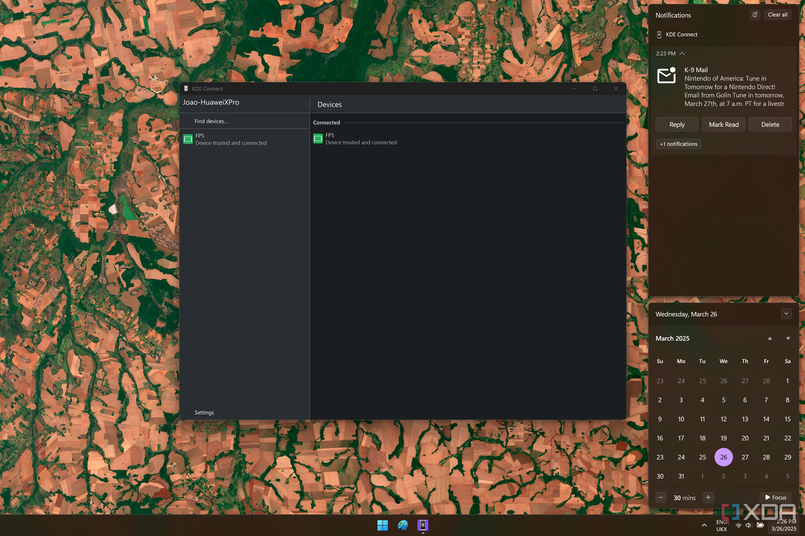 Screenshot of KDE oOnnect on Windows 11, with the Windows notification center open showing notifications synced from a phone