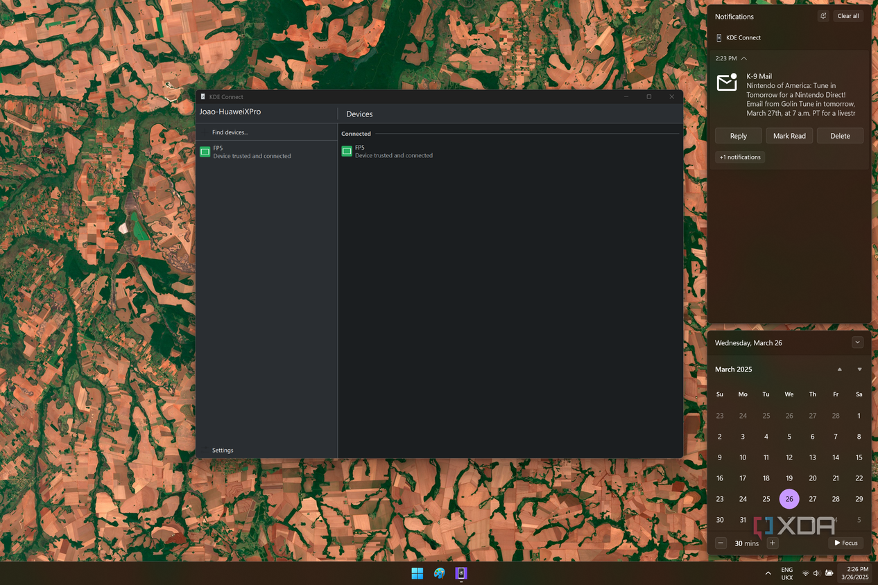 Screenshot of KDE oOnnect on Windows 11, with the Windows notification center open showing notifications synced from a phone