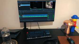 Kdenlive displayed on PC desktop, with lamp, bottle, lego, and chromebook in view
