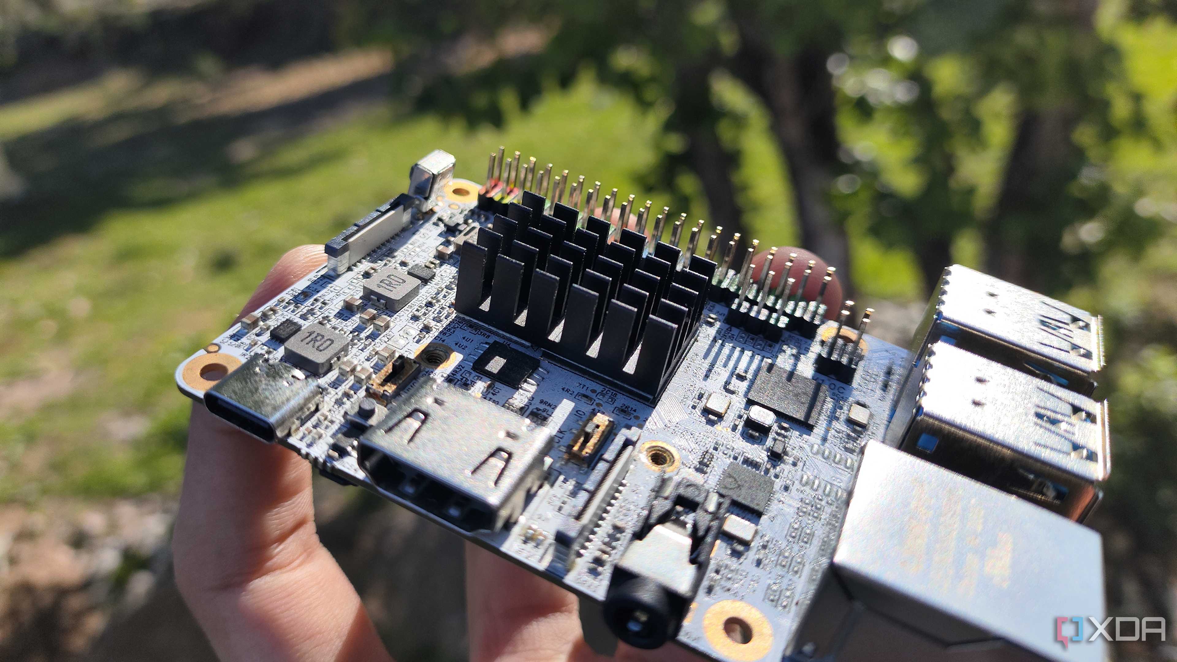 A person holding a Libre Computer Alta SBC