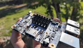 A person holding a Libre Computer Alta SBC