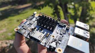 A person holding a Libre Computer Alta SBC