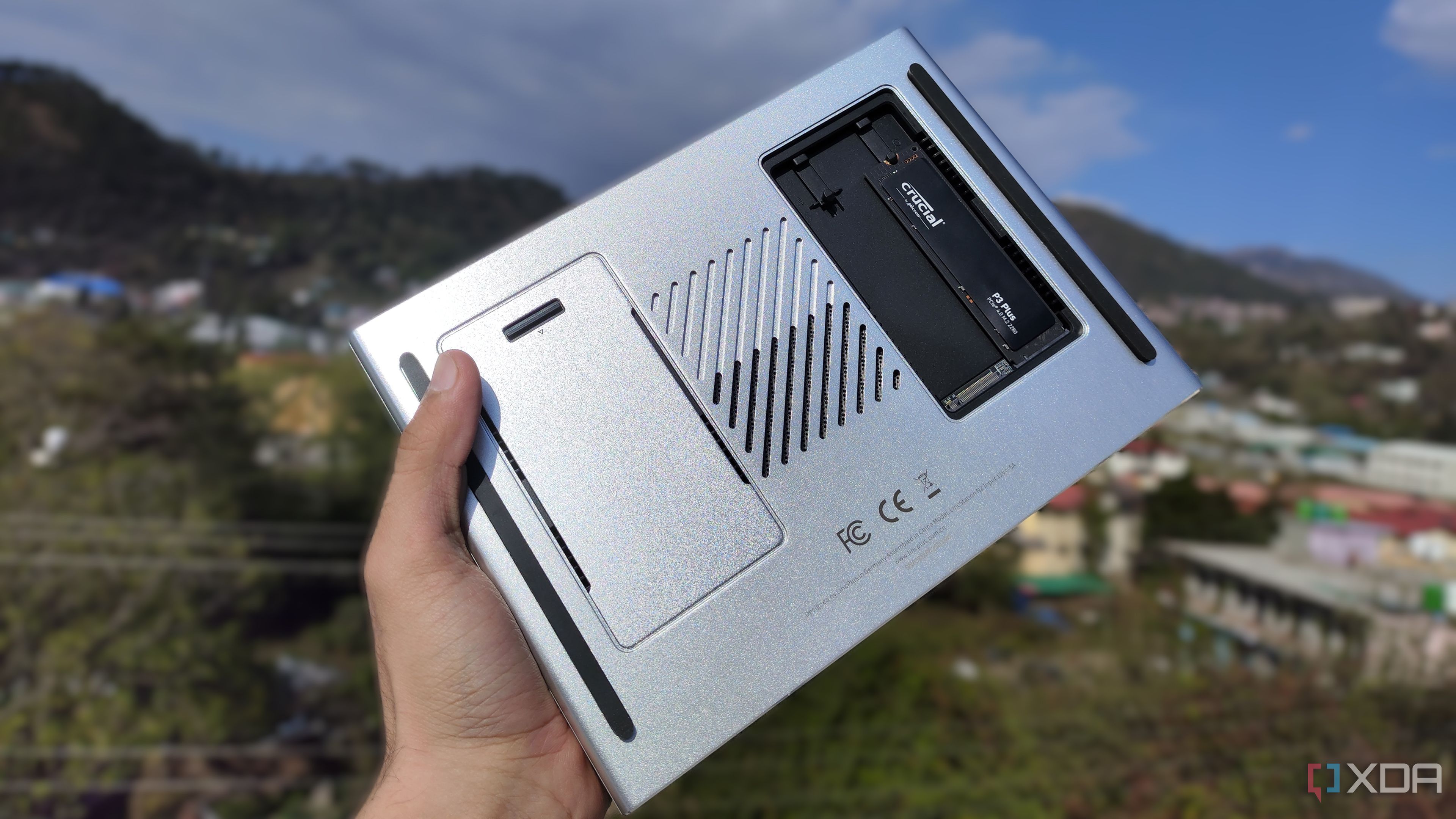 A person holding the LincPlus LincStation N2 NAS