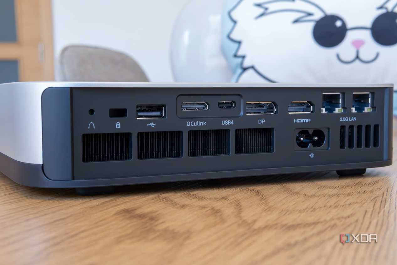 Close-up of the ports and buttons on the rear of the Minisforum AI X1 Pro
