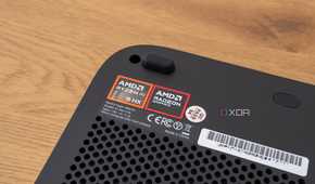 Close-up of the AMD Ryzen and Radeon logos on the Minisforum AI X1 Pro