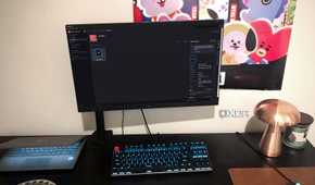 Mudstack cloud storage tool displayed on desktop PC, with lamp, chromebook, and poster in view