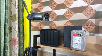 An Obsbot camera near some TerraMaster NAS devices