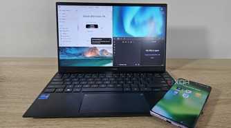notion and obsidian open on a laptop with a phone showing productivity app icons