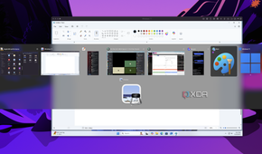 Screenshot of a Windows 11 VM running inside macOS with the macOS task switcher showing the Windows 11 Paint app as one of the apps the user can switch to