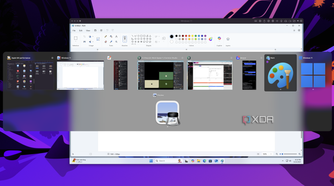 Screenshot of a Windows 11 VM running inside macOS with the macOS task switcher showing the Windows 11 Paint app as one of the apps the user can switch to