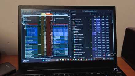 Laptop screen showign Process Explorer and Task Manager side by side