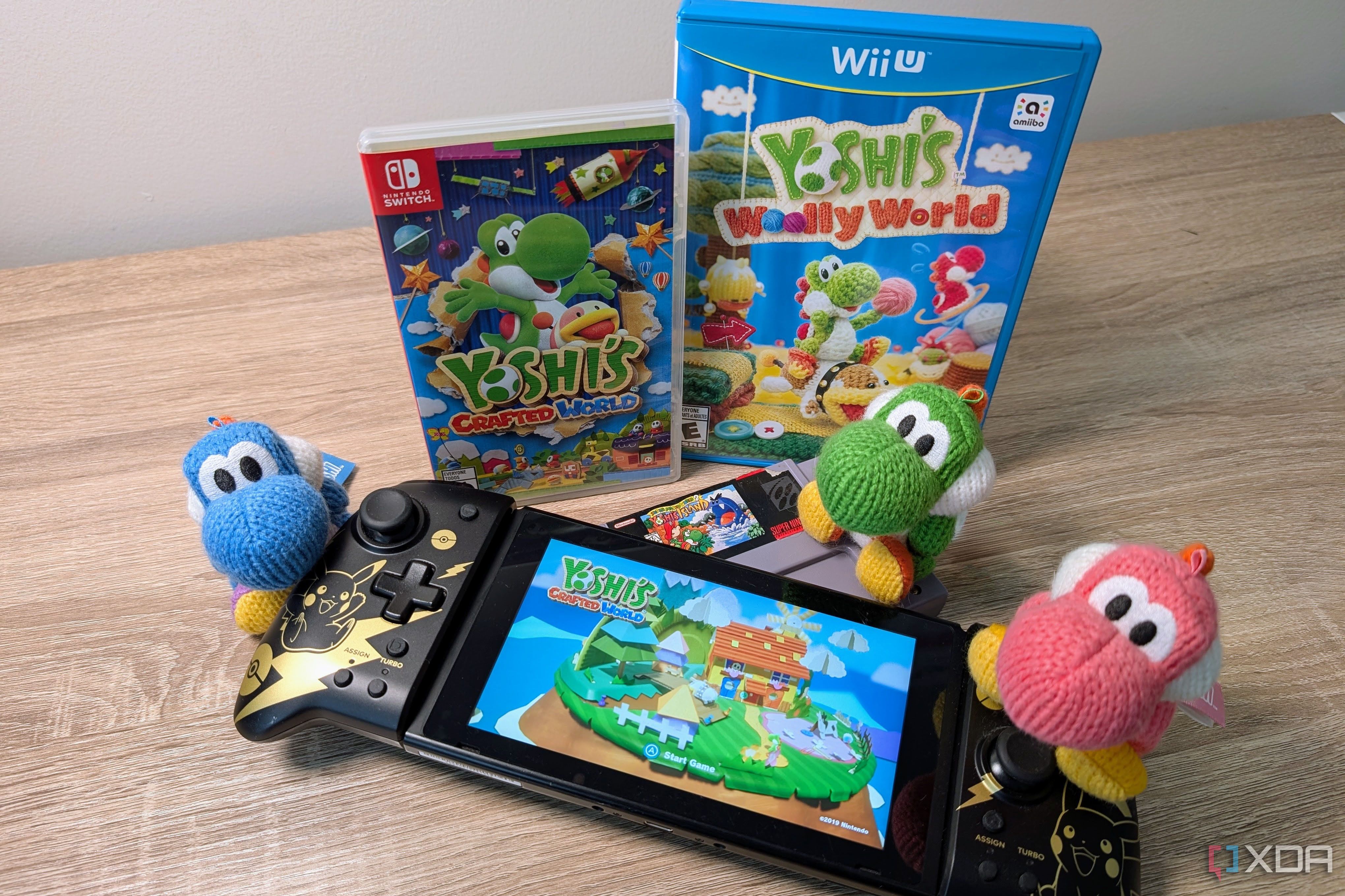 Three different color Yoshis settled around a Nintendo Switch featuring Yoshi's Crafted World, with an SNES, Wii U, and Switch game back featuring Yoshi in the background