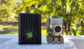 A Radxa X4 placed next to a Raspberry Pi 5