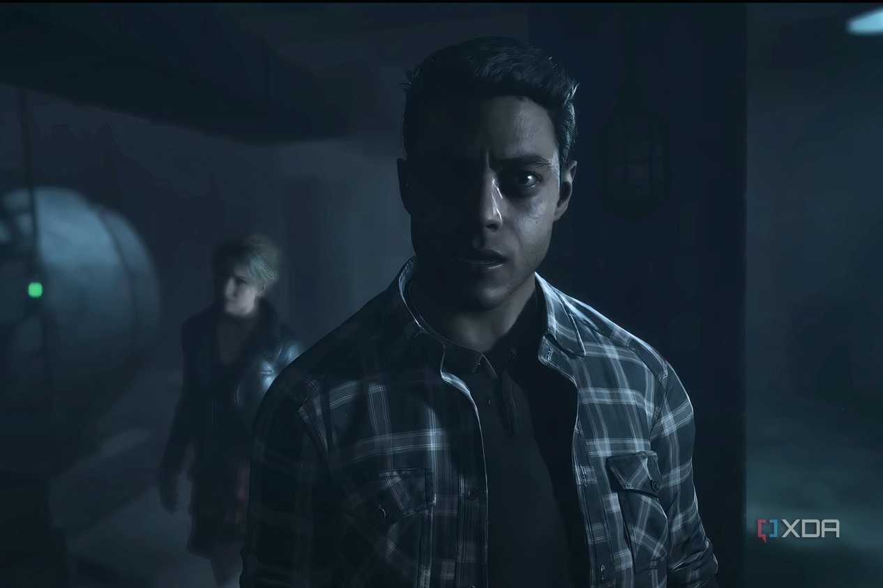 A screenshot from the game "Until Dawn", showing a man in a flannel shirt.